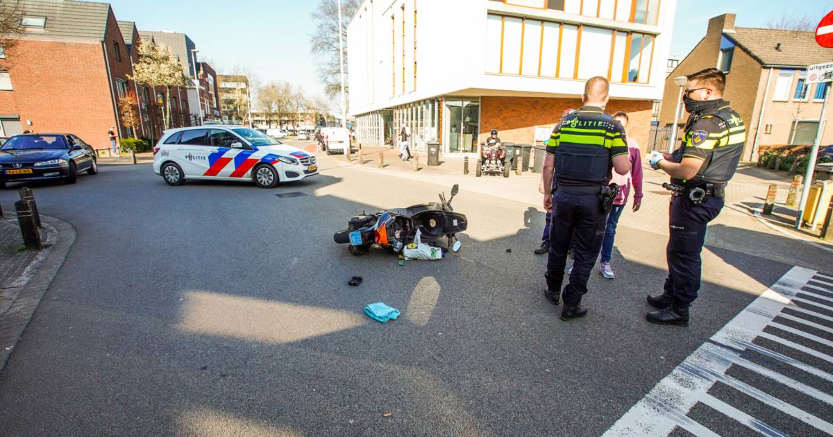 Scooterrijder gewond bij aanrijding in Eindhoven, automobilist rijdt door na ongeval.