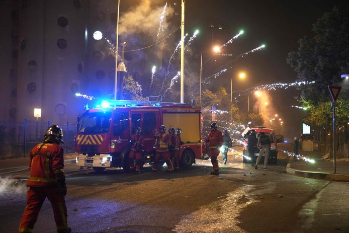 Fireworks explode near firefighters during protests in Nanterre.  Photo from June 28th.