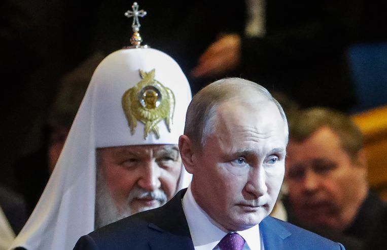 Patriarch Kirill van de Russisch-orthodoxe kerk (l) en president Poetin. Beeld Mikhail Metzel/TASS
