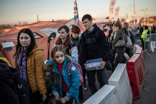 Oekraïense vluchtelingen aan de grens met Polen.