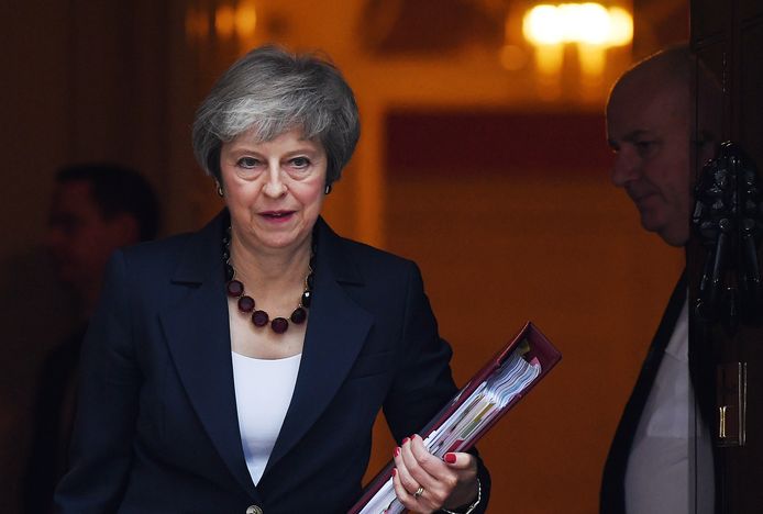 De Britse premier Theresa May wacht ongetwijfeld een politiek gevecht om voldoende steun te krijgen in het parlement.