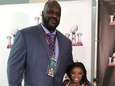 Turnster Simone Biles die Shaq begroet: het lijkt wel een optische illusie