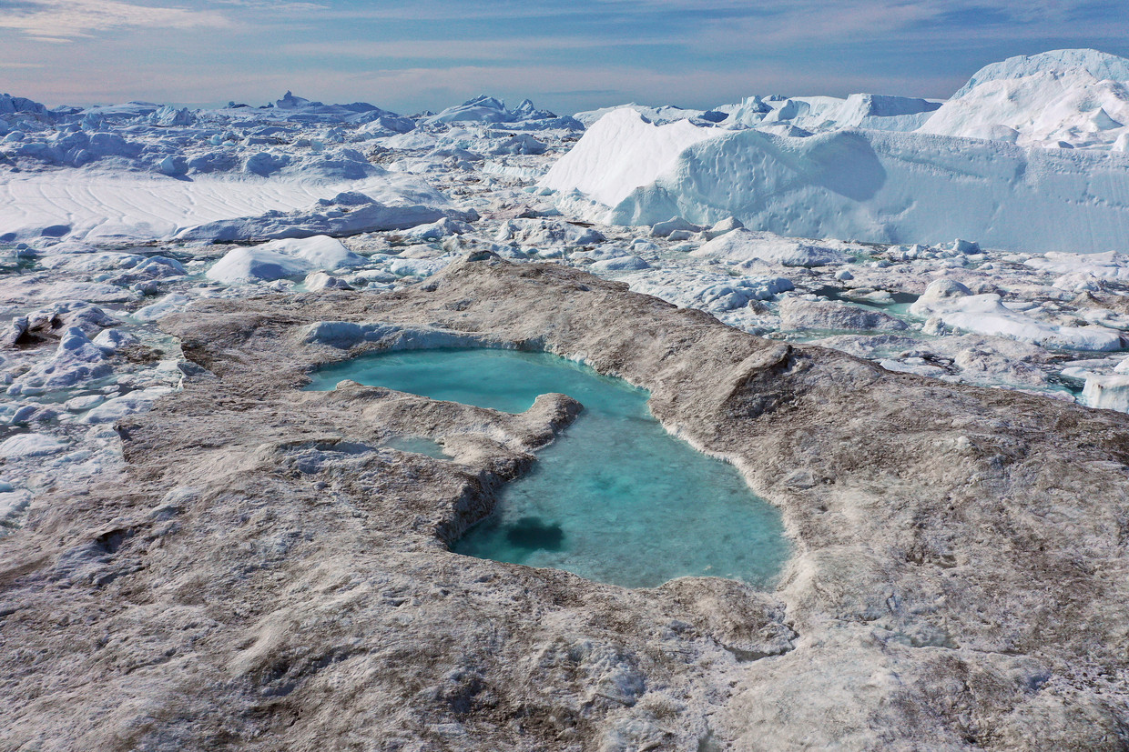 Smeltend ijs vormt een meer in de IJsfjord van Ilulissat, Groenland.  Beeld Getty Images