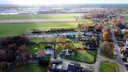 Bewoners van het Rheezerend (rechts) en de Spekopswijk (onder) maken zich zorgen over uitbreidingsplannen voor het bedrijventerrein Rollepaal, dat op de achtergrond zichtbaar is.
