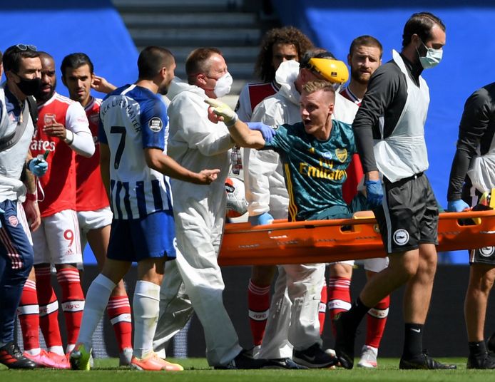 Arsenal goalkeeper Bernd Leno argues with Brighton and Hove Albion's Neal Maupay (left) as he is stretchered off the pitch with an injury during the Premier League match at the Amex Stadium, Brighton. ! only BELGIUM !