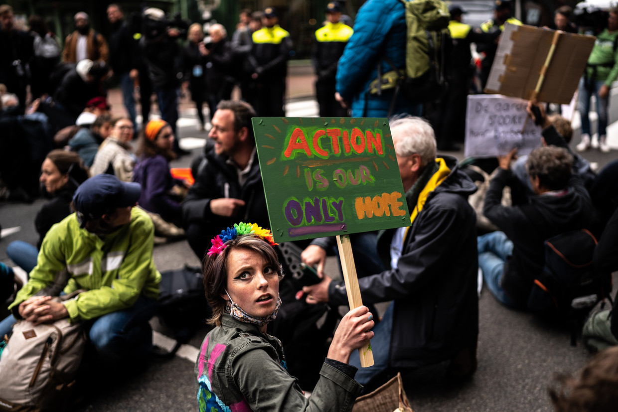 Activisten van Extinction Rebellion eerder deze week in Den Haag. Beeld Joris van Gennip
