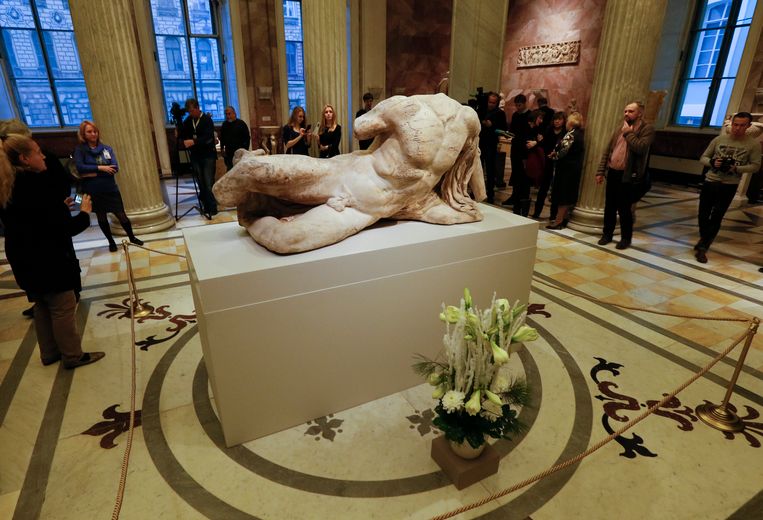 Het hoofdloze beeld van de Griekse riviergod Ilissos in het museum de Hermitage in de Russische stad St. Petersburg. Beeld ap