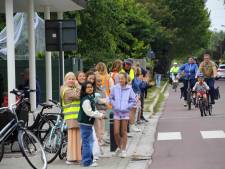 Fietsers overladen met applaus in Gent: “We toveren een glimlach op elk gezicht”