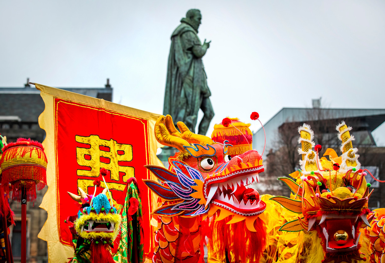Een optocht door het centrum van Den Haag tijdens de viering van het Chinese Nieuwjaar in en om het stadhuis. Beeld ANP