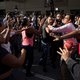 Rellen op vliegveld Caracas na terugkeer oppositieleider Guaidó