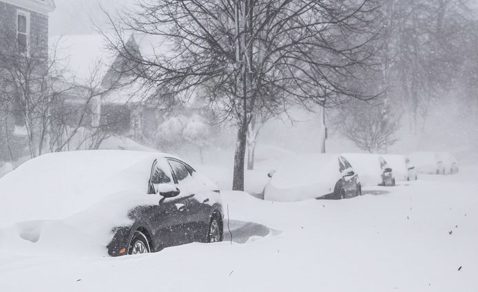 Cars covered in snow in Buffalo, New York.