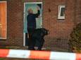 De politie doet onderzoek na de dodelijke steekpartij in een woning aan de Klaproosstraat in Asten.
