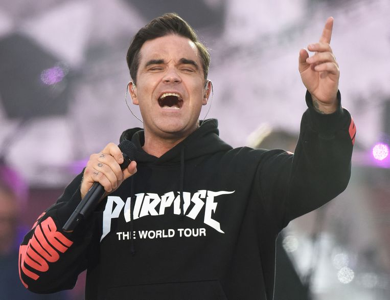 Robbie Williams kwam Angels zingen tijdens het benefietconcert Beeld AP