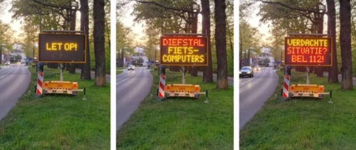Tekstkarren staan in het dorp, met daarop de waarschuwing voor diefstal van fietscomputers.