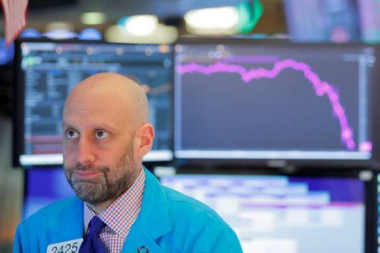 Een beurstrader op Wall Street zucht bij de koersval.