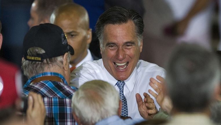 De Republikeinse presidentskandidaat Mitt Romney gisteren tijdens een campagnebijeenkomst in Florida. Beeld reuters