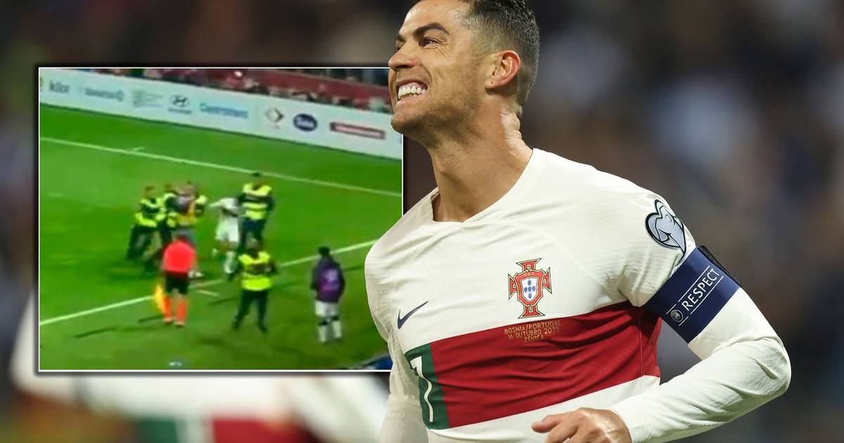 Ronaldo is attacked by a Bosnian fan inside the field after two goals, and Portugal scores five goals before the end of the first half  soccer