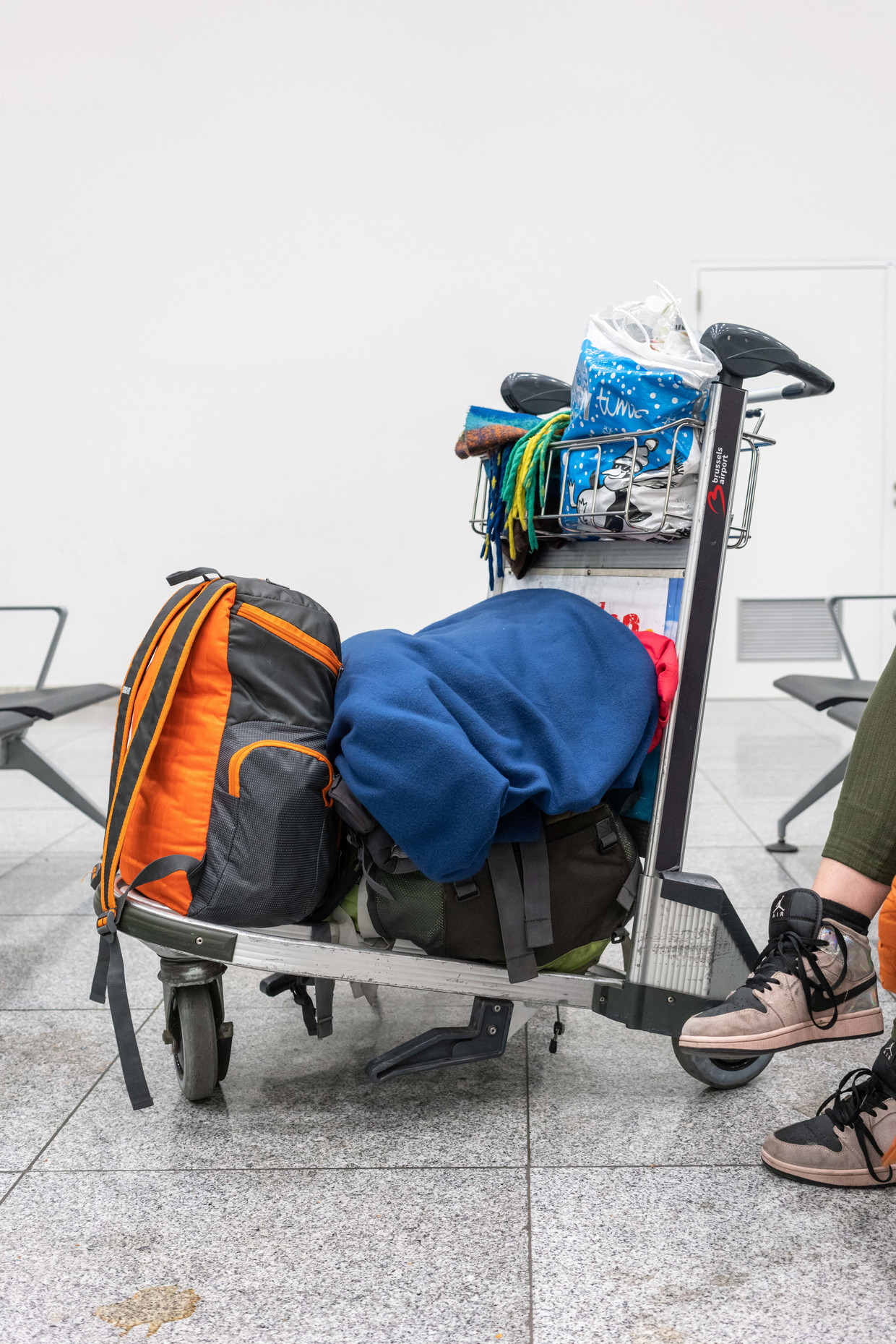 Margaret doesn't want to be photographed, but she gets around the airport every day in this buggy.  Photo ID/Jeff van den Bosch