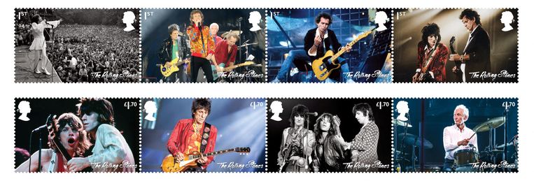 Acht van de twaalf postzegels van de legendarische The Rolling Stones, uitgegeven door de Britse Royal Mail.  Beeld via REUTERS
