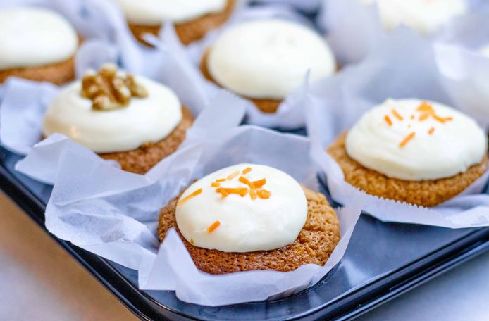 Carrot muffins with cream cheese glaze