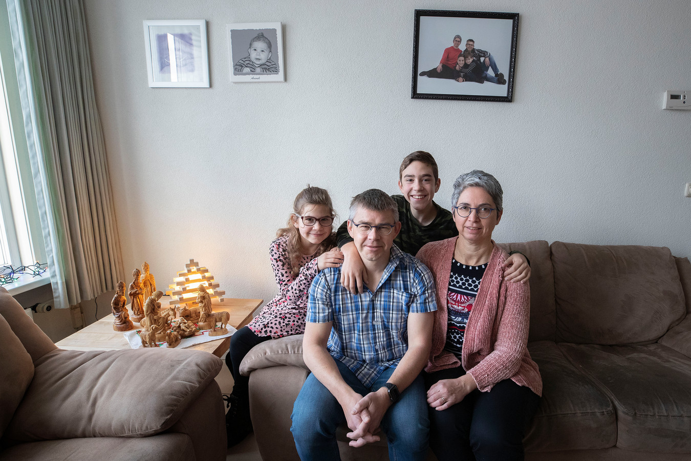 Harrie Baudewijns met zijn vrouw Mariëlle en hun kinderen Anouk en Tim.