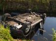 Auto in de sloot in Asten, bestuurder ongedeerd