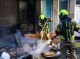 Woningen ontruimd wegens brand in afvalcontainer, politie vermoedt brandstichting
