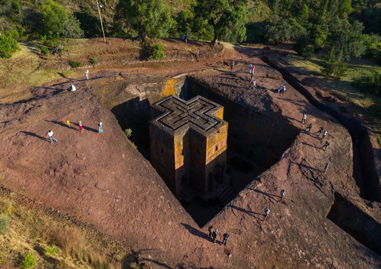 Uit de rotsen gehouwen kerk in Lalibela, in de Ethiopische regio Amhara. Beeld Getty