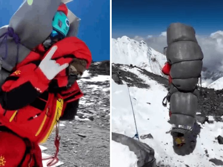 Nepalese gids tilt onderkoelde klimmer op rug Mount Everest af