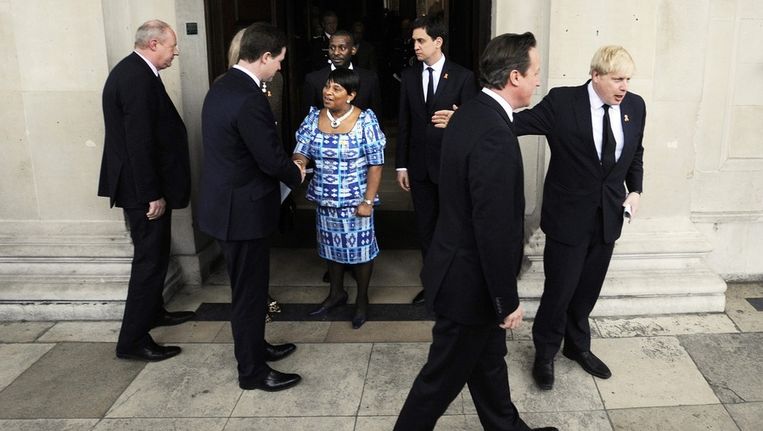 Burgemeester van Londen Johnson (rechts) en premier Cameron bij de herdenkingsdienst voor Stephen Lawrence, vorige week. Beeld EPA