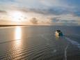 Veerboot naar Ameland bij zonsondergang.