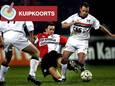 Bart Latuheru (r) in duel met Feyenoorder David Connolly.