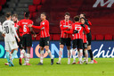 Spelers van PSV vieren de 2-0 zege op Sturm Graz.