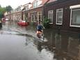 Een aantal straten in Vlaardingen staan onder water, na zware regenbuien. ANP GINOPRESS