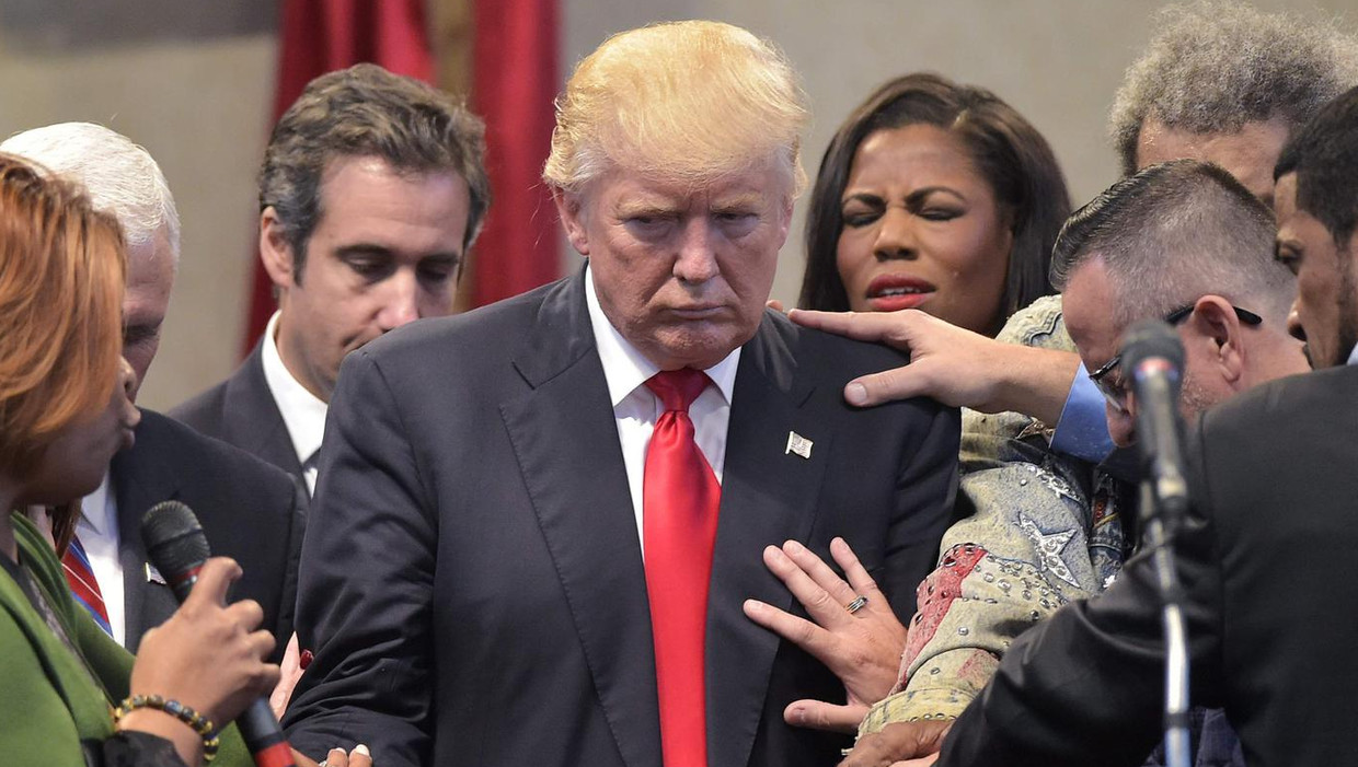 In Ohio legden pastors afgelopen zomer Trump de handen op. Beeld afp