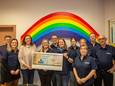 De organisatoren van de Relegemse Dorpsfeesten mochten de cheque overhandigen aan een vertegenwoordiger van Kom Op Tegen Kanker.