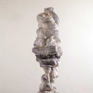 Steel structures and light lines dominate the indoor sculpture garden at KunstRAI