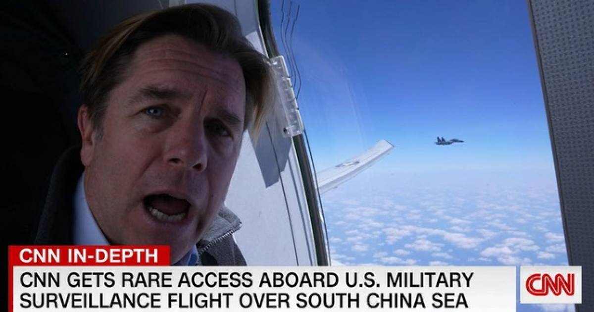 A Chinese fighter intercepts an American plane with a CNN crew on board |  outside