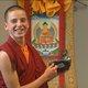 Monnik Giel geeft les over boeddhisme