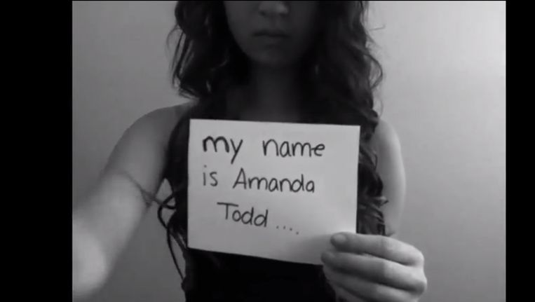 Amanda Todd plaatste in 2012 een filmpje op YouTube waarin ze vertelt hoe haar leven werd vergald door een man die seksbeelden van haar had gemaakt via de webcam. Beeld AFP