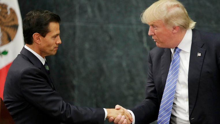 Donald Trump (rechts) en de Mexicaanse president Peña Nieto. Beeld reuters