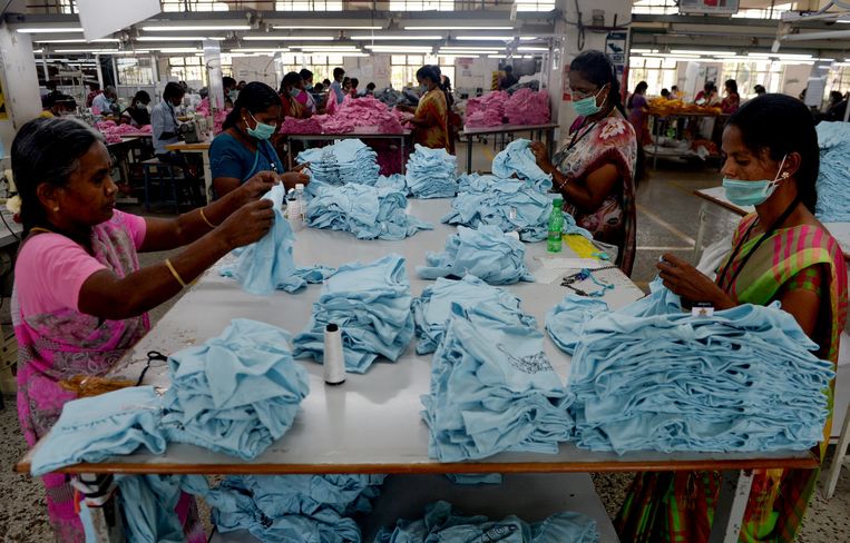  Tiruppur, India. Beeld AFP