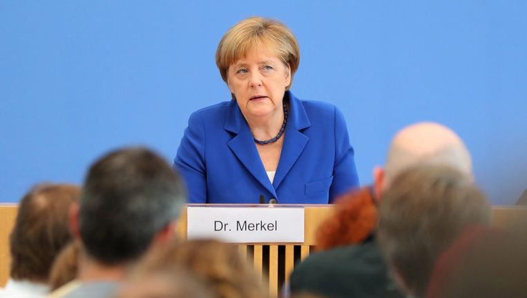 Angela Merkel tijdens de persconferentie in Berlijn Beeld epa