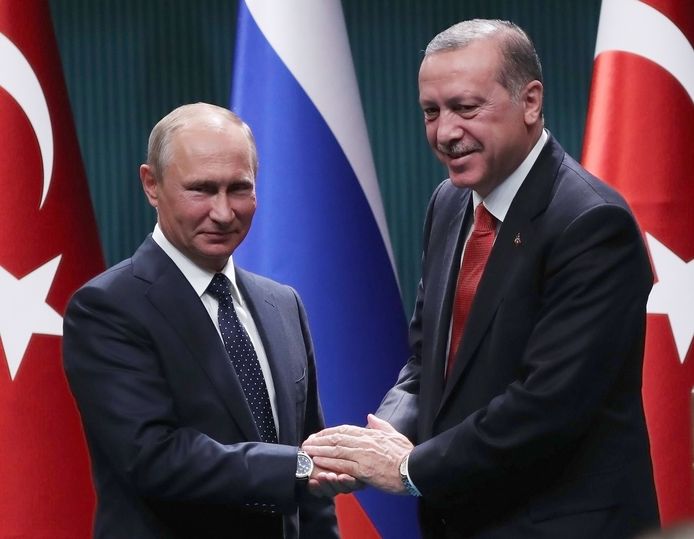 De Russische president Vladimir Poetin an zijn Turkse ambtgenoot Recep Tayyip Erdogan, vanavond in Ankara.