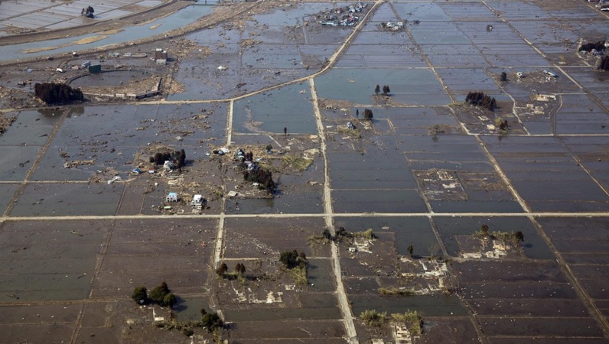 Van het Michinoku Kashima Stadion, in Minami Soma City in de buurt van Fukushima, is na de tsunami weinig meer te herkennen. Beeld epa