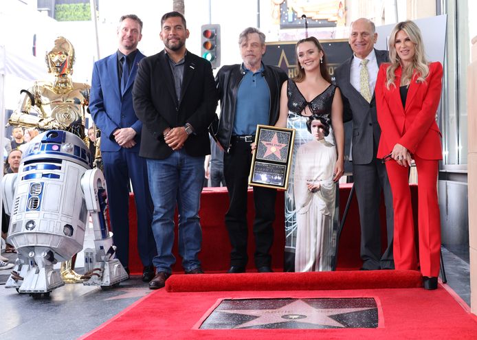 Matt Fritch, Hugo Soto-Martinez, Mark Hamill, Billie Lourd, Steve Nissen and Ellen K pose in the photo.  Carrie Fisher was honored with a star on the Hollywood Walk of Fame on May 4, 2023 in Hollywood, California.