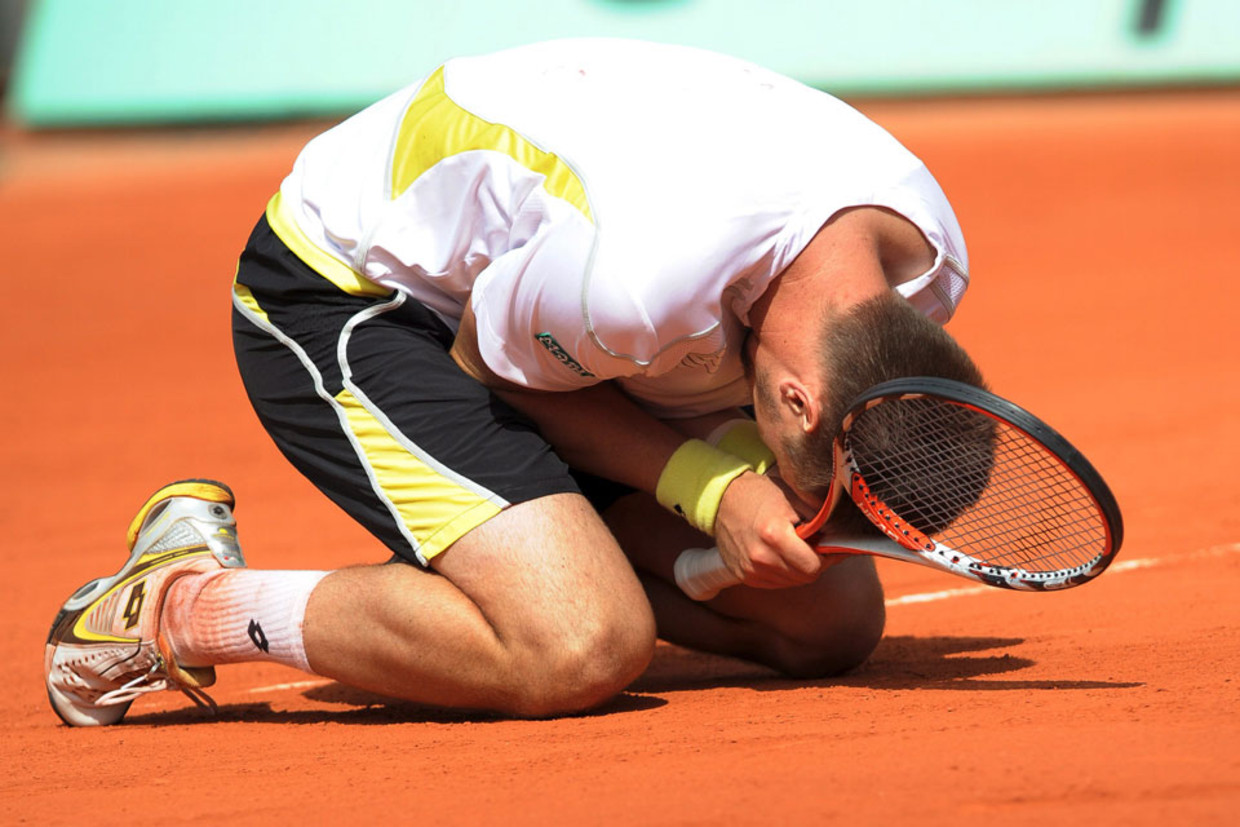 Robin SÃ¶derling viert zijn overwinning tegen Fernando Gonzalez. (ANP) Beeld 