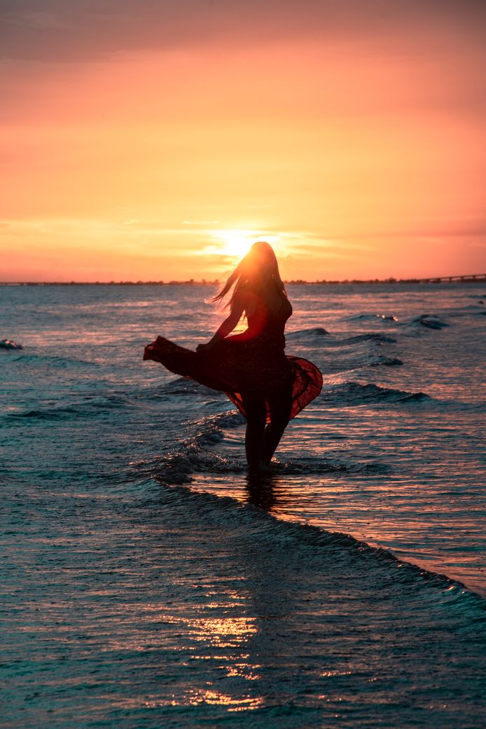 "Ga bij een zonsondergang deels voor de foto staan."