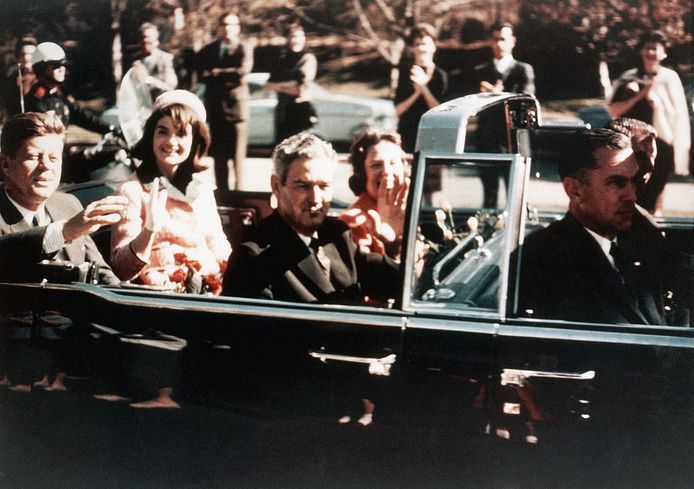 The party was driven through the streets of Dallas in a convertible.  In the back were the Kennedys, in front of them were the Connally's.  President Kennedy inquired in advance about the weather and decided that the roof of the limousine could be lowered.