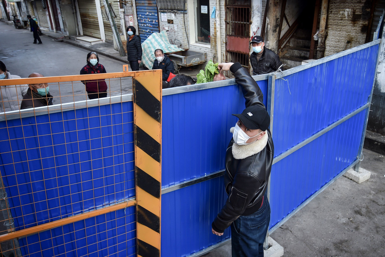 In westerse media werd veel geschreven over de lockdown in Wuhan als typisch product van een totalitaire staat. Beeld AFP